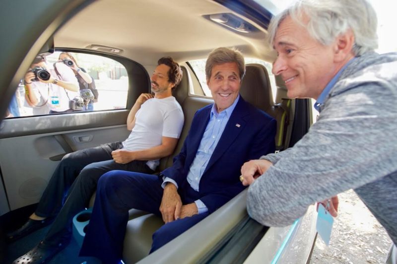 Search in Pics Android Nougat statue, John Kerry in self driving car