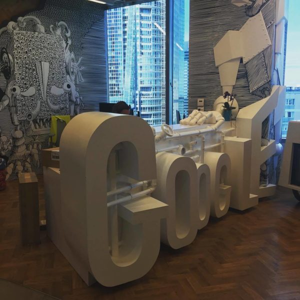 white-pipe-based-google-lobby-desk-signage