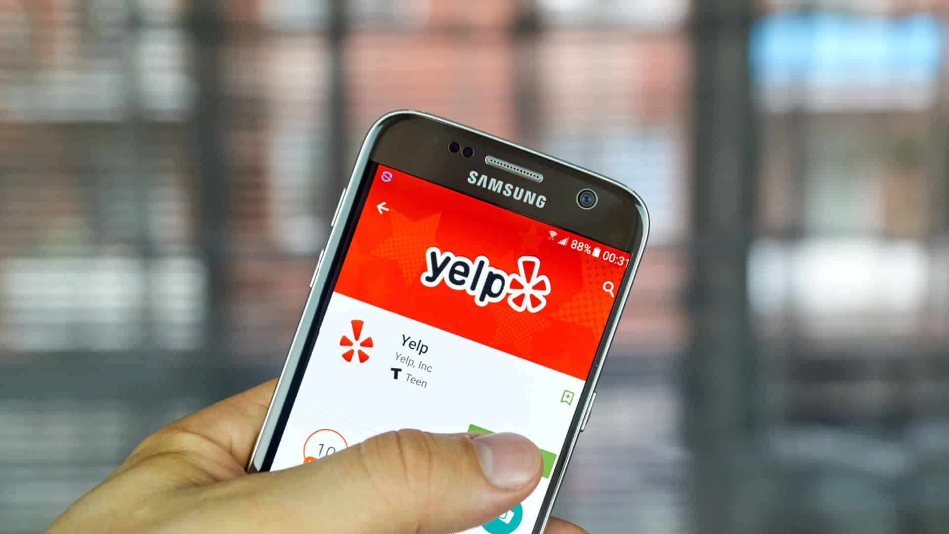 #Yelp ad revenue jumps 13% to record $1.28 billion